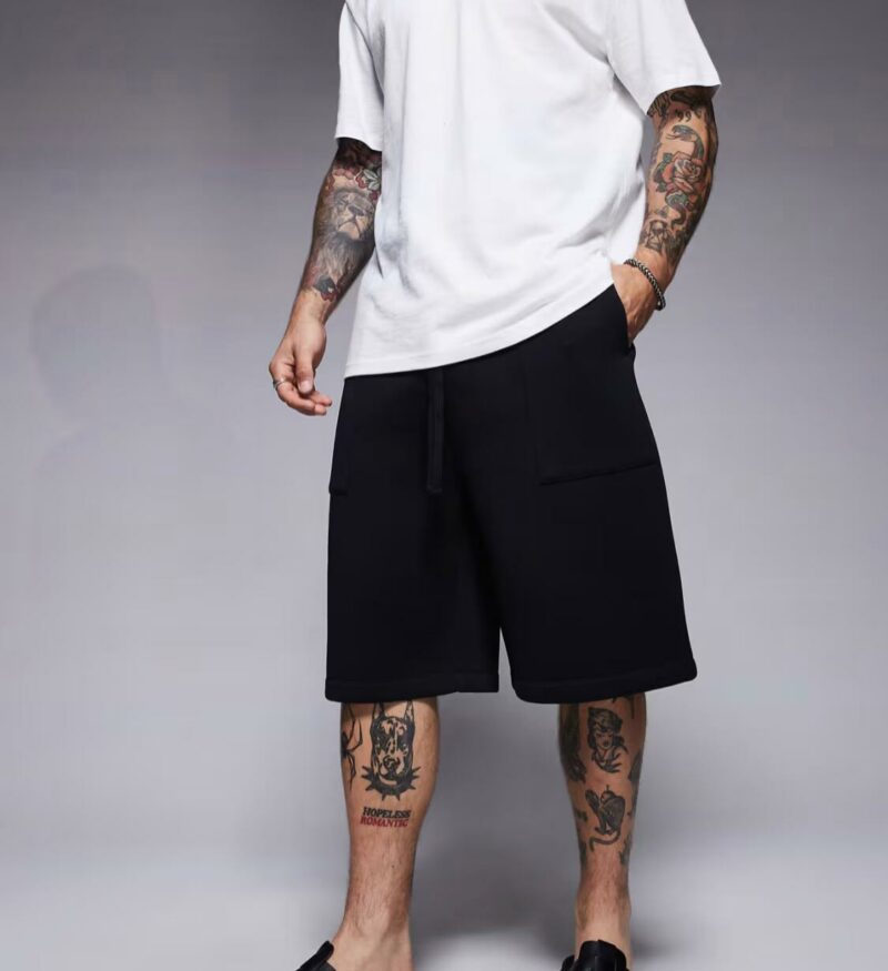 ASOS DESIGN oversized longer length scuba shorts in black - Image 2