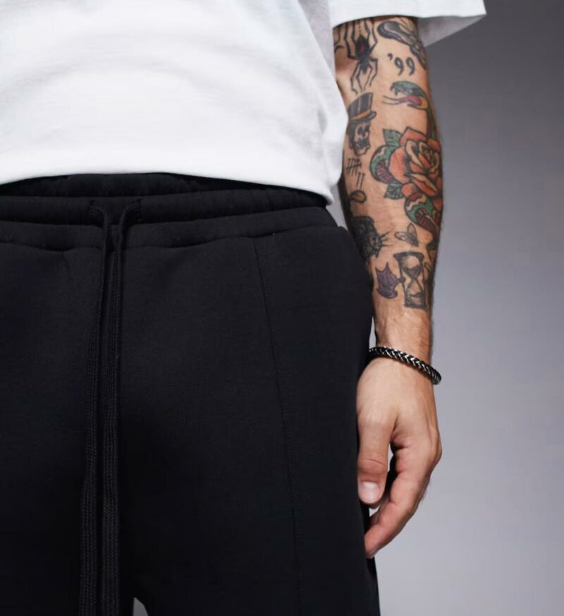 ASOS DESIGN oversized longer length scuba shorts in black - Image 3