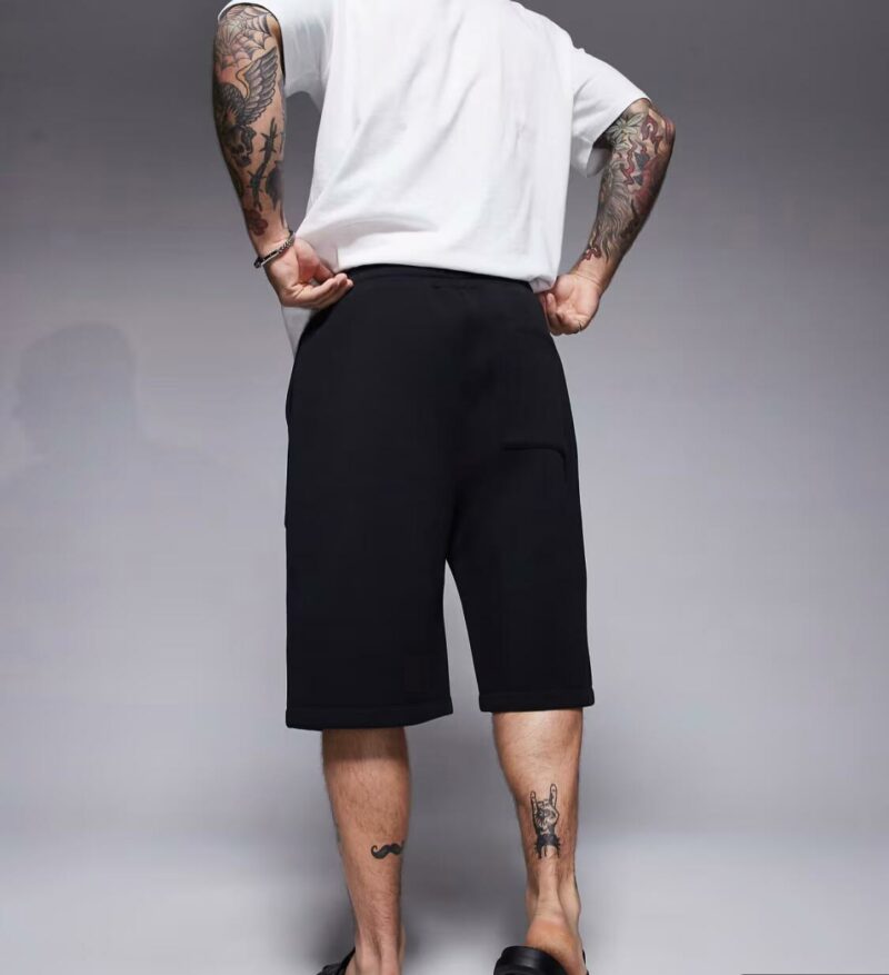 ASOS DESIGN oversized longer length scuba shorts in black - Image 4