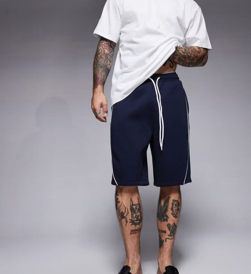 ASOS DESIGN oversized short with side piping in navy - Image 2