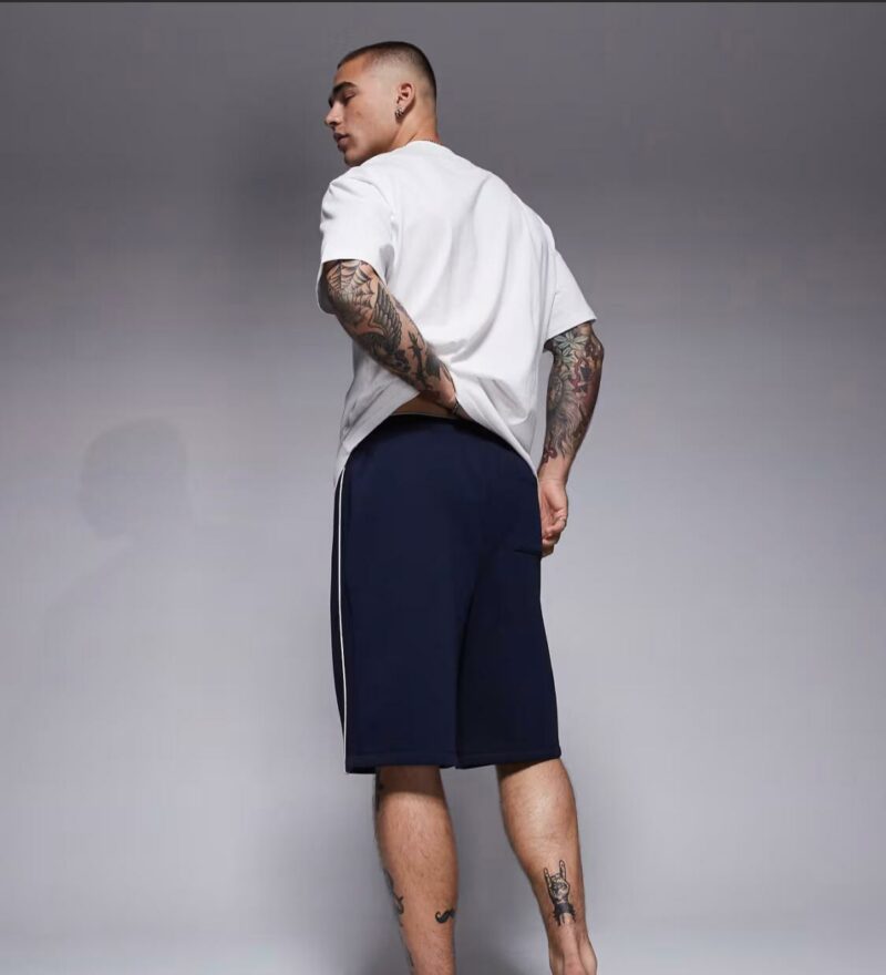 ASOS DESIGN oversized short with side piping in navy - Image 3