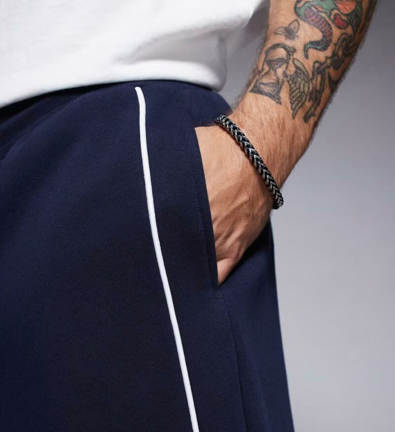 ASOS DESIGN oversized short with side piping in navy - Image 4